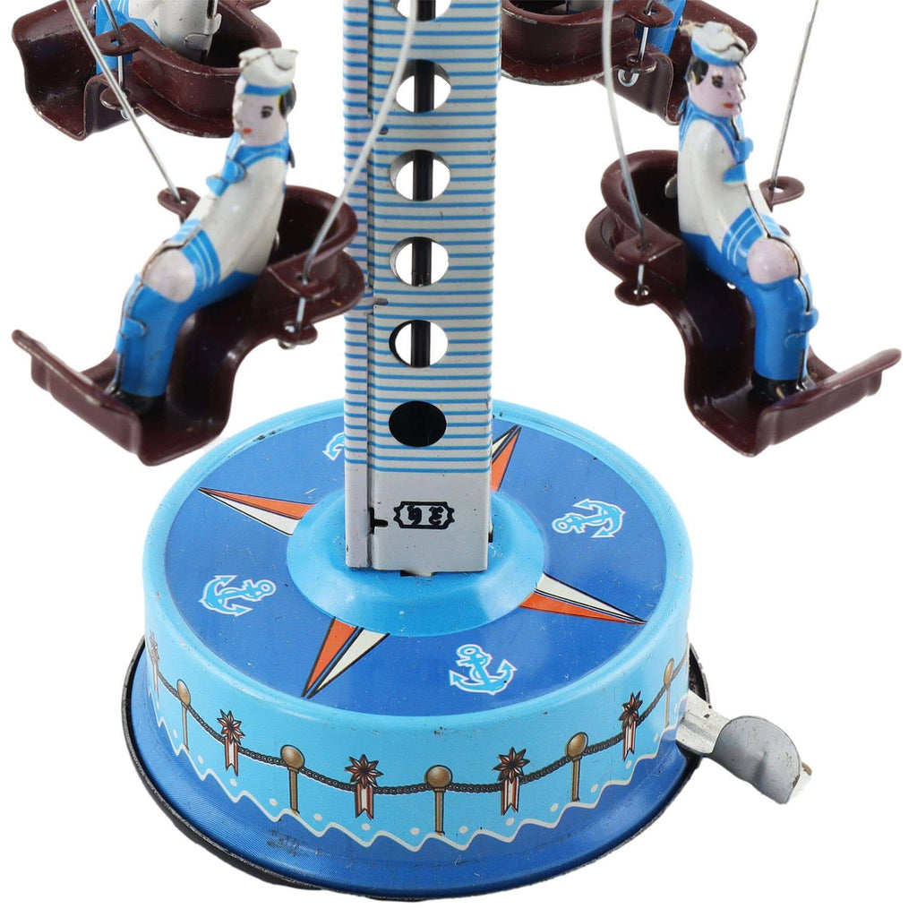 Handaufgezogenes Blechkarussell Matrosen – Nostalgisches Vintage Spielzeug mit maritimen Motiven.